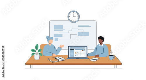 Two people collaborating at a table with a laptop and whiteboard.