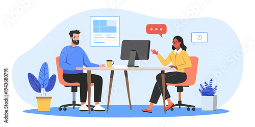 Two professionals discuss work during a virtual meeting at a desk