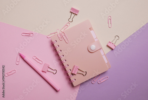School stationery with notebook on a pastel background. Education concept. Flat lay. Top view