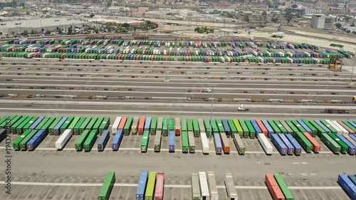 Cargo ship in transit amid Middle East geopolitical trade disruptions. impact of Strait of Hormuz disruptions on oil prices, maritime logistics, and the fluctuating demands of the global economy.