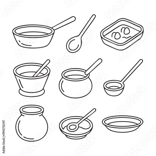 Various cooking pots and pans with spoons and ingredients in a line kitchen utensils