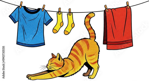 Cat stretching beside colorful laundry hanging on a clothesline  