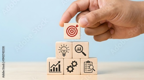 Business strategy and goal setting concept with wooden blocks