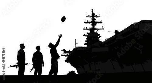 Military personnel playing catch on aircraft carrier deck at sunset