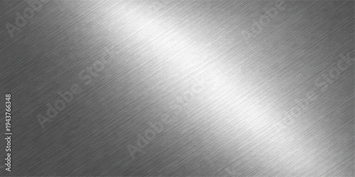 A shiny brushed metal surface with a silver textured industrial pattern and polished steel look