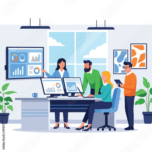 A team in an office setting reviewing data and working on computers