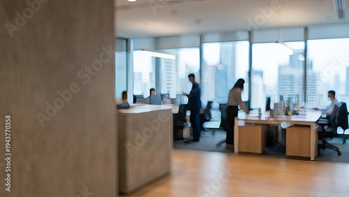 Blurred office scene with urban cityscape, and diverse colleagues collaborating and working.