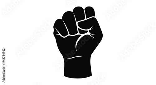A raised fist representing strength and solidarity black silhouette