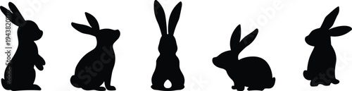 Cute rabbit silhouettes collection featuring different bunny poses and side views isolated on white background, animal vector icons for Easter design, wildlife graphics set