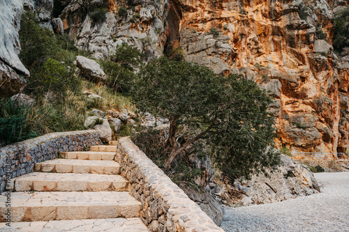 Fotografie Stone steps along rocky canyon wall at Torrent de Pareis, Mallorca