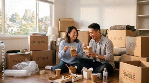 Happy Couple Eating Takeout on Floor Amidst Moving Boxes