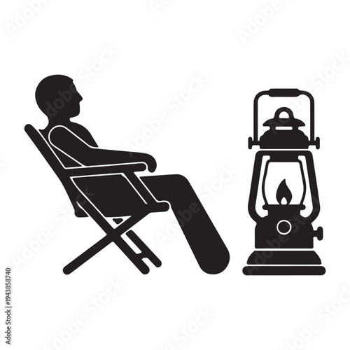 Silhouette of a person relaxing in a camping chair next to a lit kerosene lantern