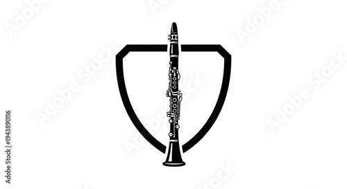 Clarinet musical instrument in shield.