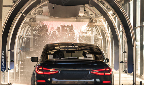 Photos Black car in an automatic car wash