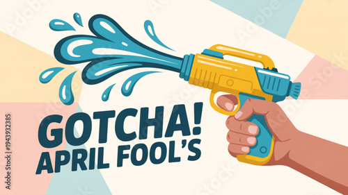Hand holding yellow water gun with blue accents and 'gotcha april fool's' text on colorful background