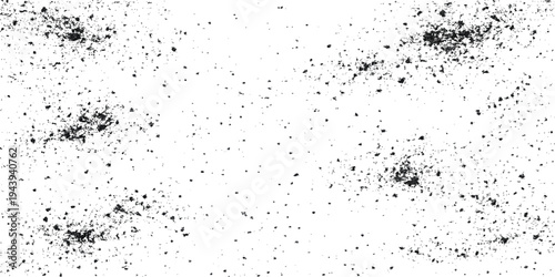 Abstract grunge background featuring ink splashes and water drops on a dirty paper texture with paint splatters and liquid droplets for a unique artistic wallpaper design