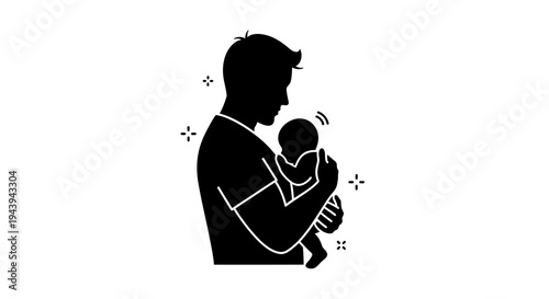 Father holding newborn baby close.