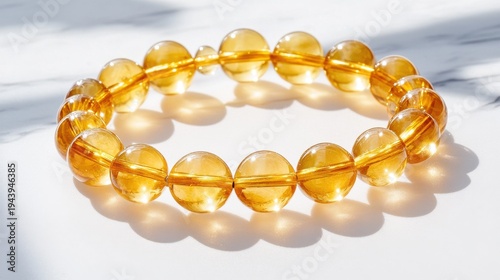 Citrine Bracelet: A radiant citrine bracelet, showcasing the beauty of polished gemstones, is elegantly displayed, emanating a warm, inviting glow.