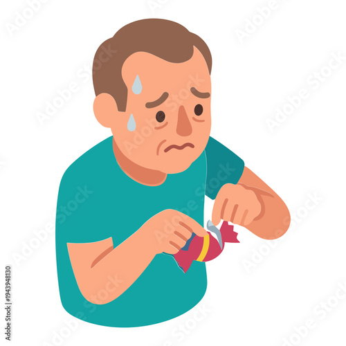 A man struggles to open a wrapped candy while sweating.