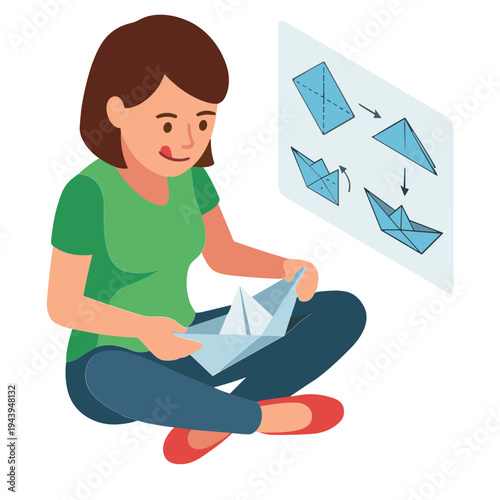 Woman sitting cross-legged making origami from paper instructions