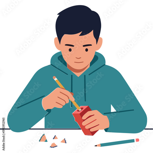 A boy sitting at a table is sharpening a pencil with a sharpener.