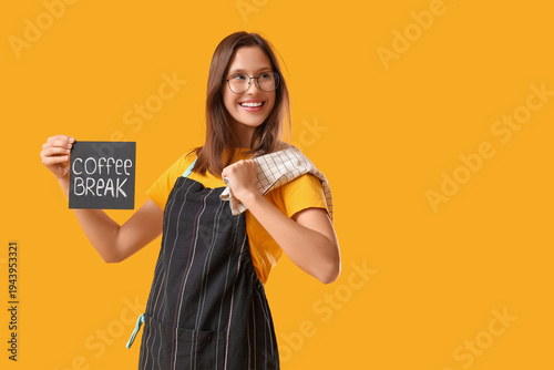 Happy young female barista ...