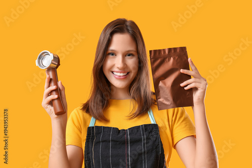 Happy young female barista ...