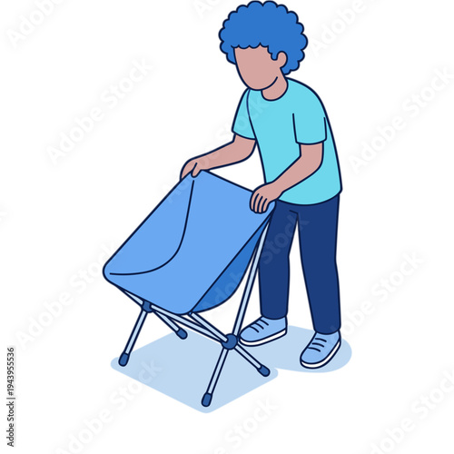 A person is folding and putting away laundry in a drying rack indoors.