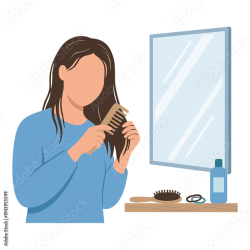 Woman brushing hair in front of a mirror with comb and products