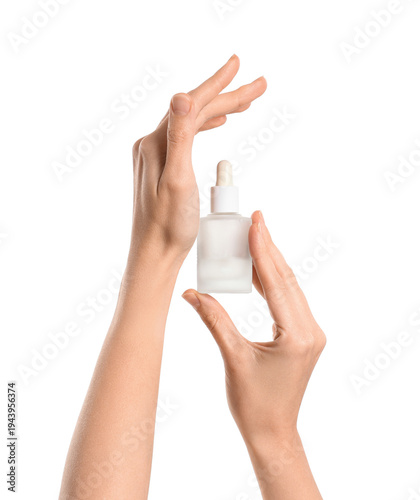 Female hands with bottle of...