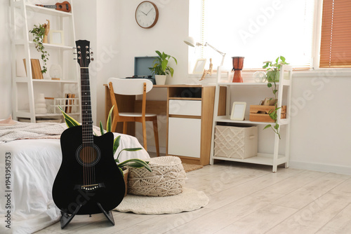 Interior of light bedroom w...