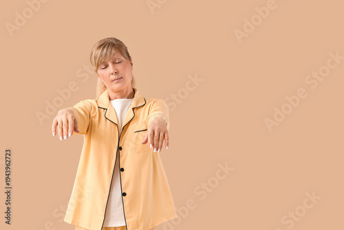 Female sleepwalker in pajam...