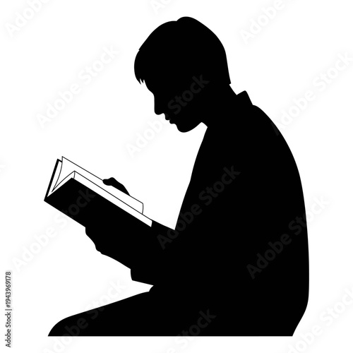A person reading a book in a quiet moment of solitude and introspection