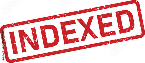 A red textured grunge rubber stamp clearly shows the word INDEXED against a bright white background