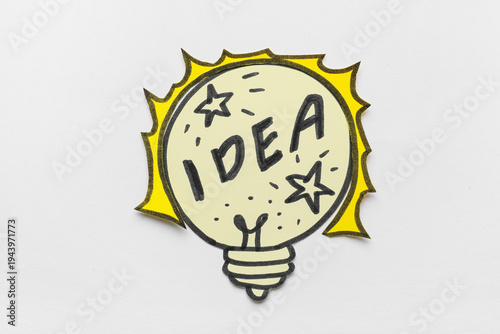 Paper light bulb with word ...