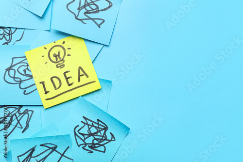 Sticky notes with drawn lig...