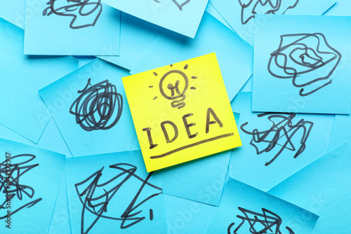 Sticky notes with drawn lig...