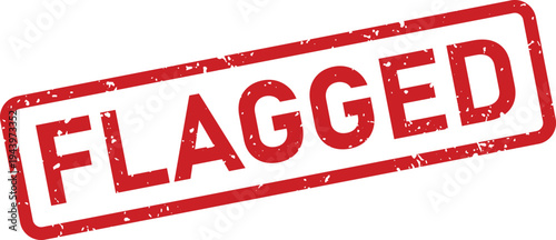 A vibrant red rectangular rubber stamp shows the prominent capitalized word FLAGGED diagonally on a clean white background
