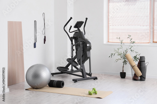 Interior of modern gym with...