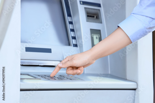 Female hand entering card's...
