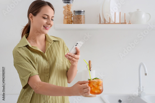 Young happy woman taking ph...