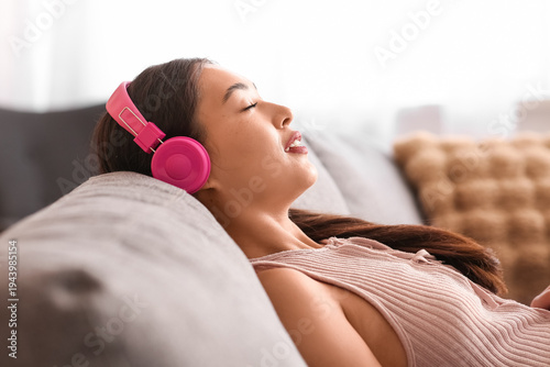 Beautiful young happy Asian...