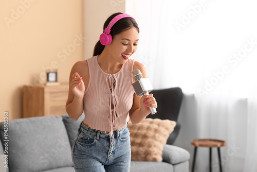 Beautiful young happy Asian...