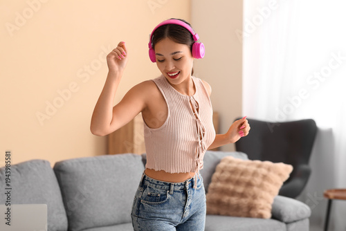 Beautiful young happy Asian...