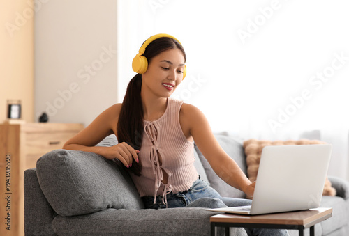 Beautiful young happy Asian...