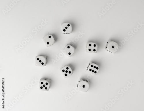 White game dice with black dots