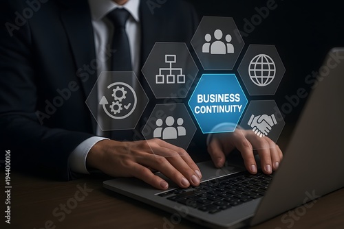 Business continuity strategy digital interface hologram above laptop with corporate professional analyzing risk management resilience planning and enterprise operational security system