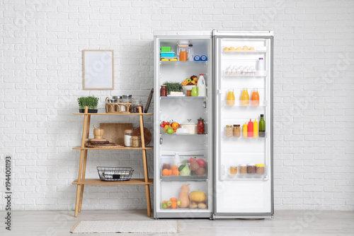 Open fridge full of differe...