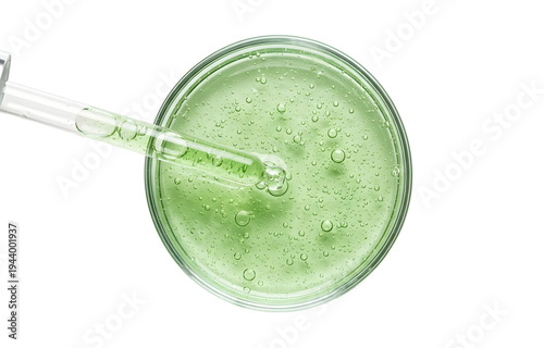A close-up, top pale green, viscous liquid containing numerous small bubbles