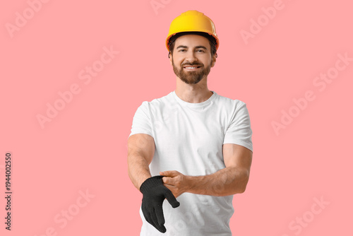 Young happy male constructi...